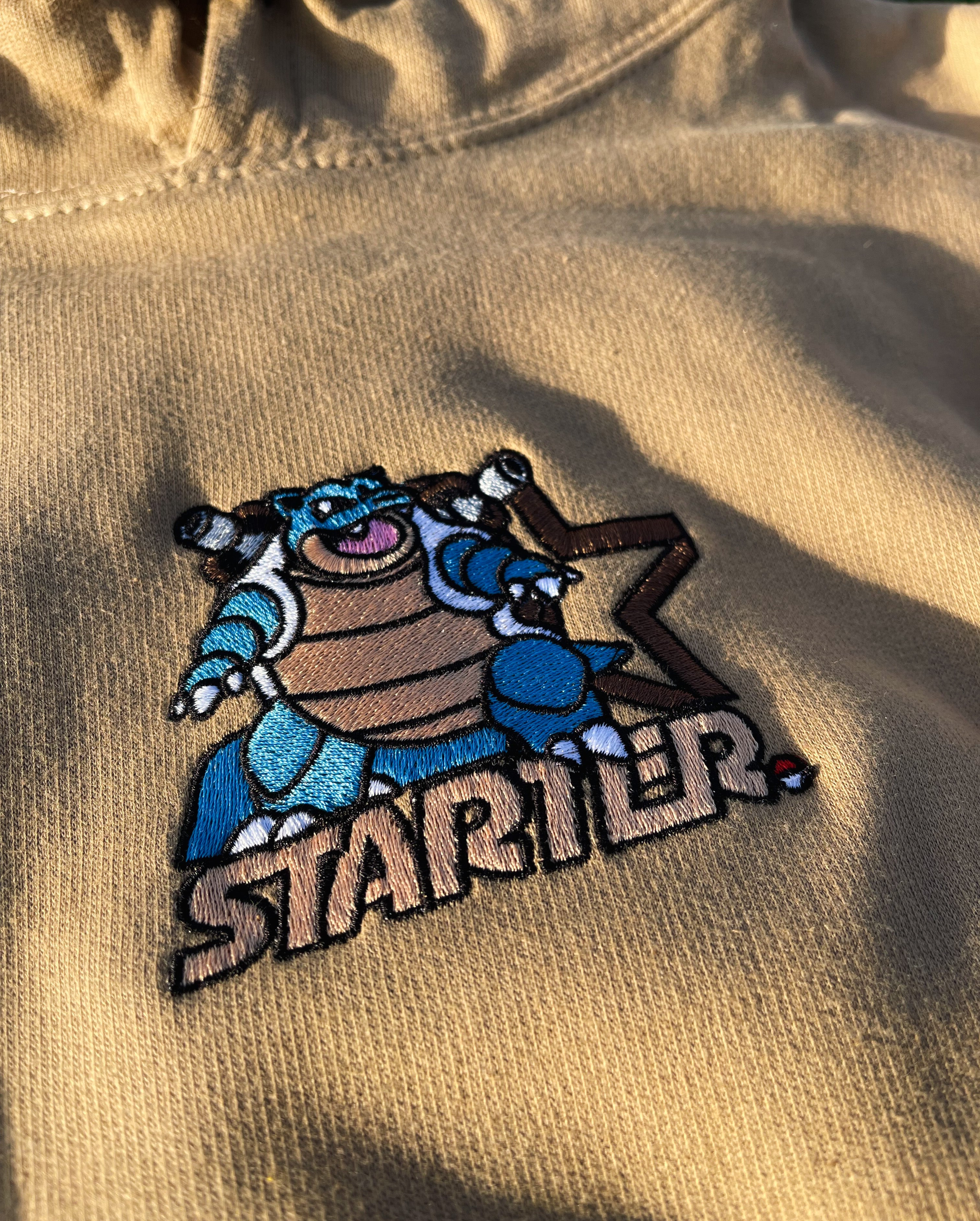 Squirtle in hot sale blastoise hoodie